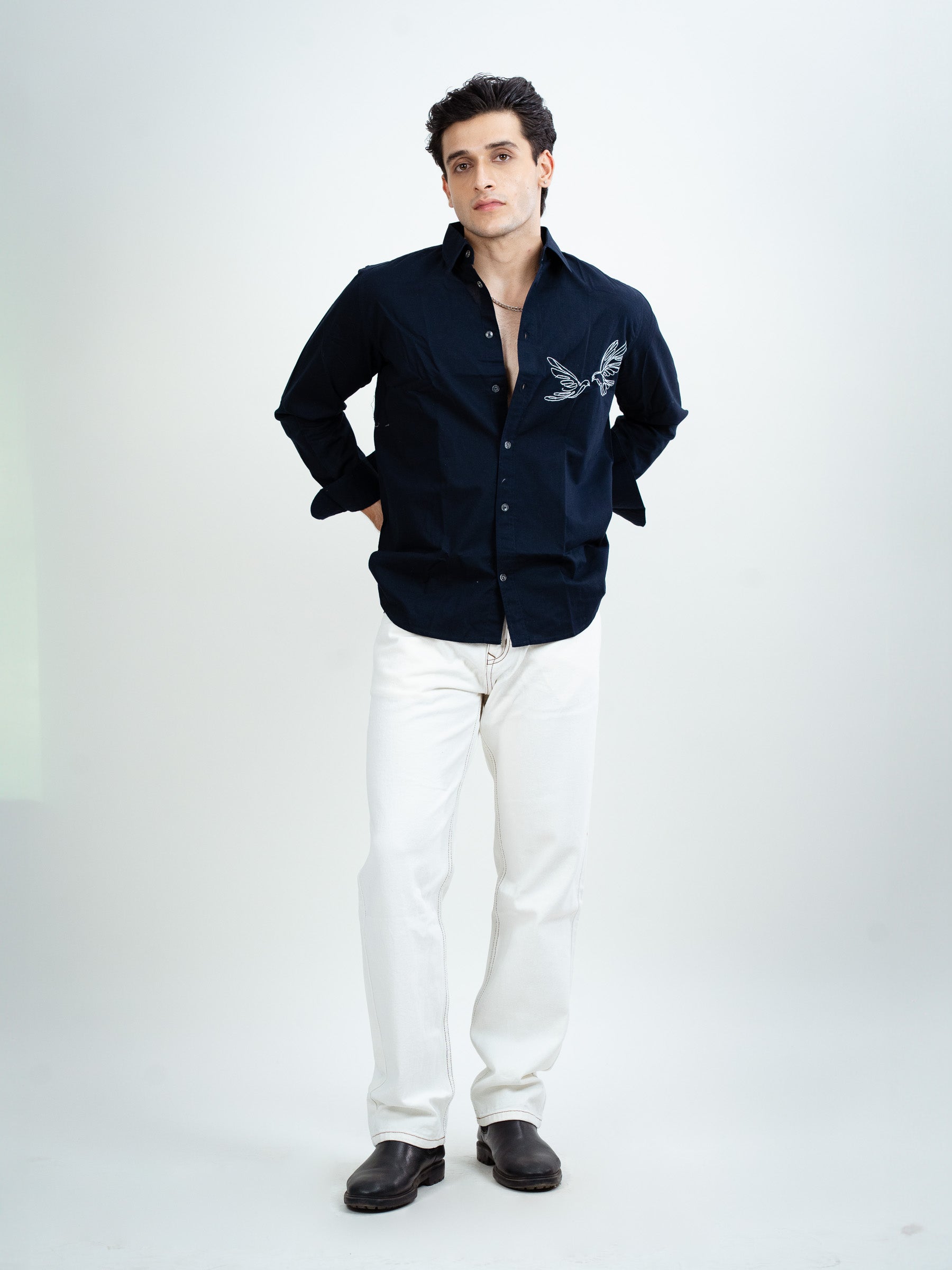 Front view of men's navy blue embroidery shirt with handcrafted detailing